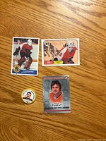 Fronts of three Bernie Parent cards and portrait coin