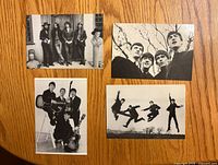 Fronts of the four Beatles postcards laid out