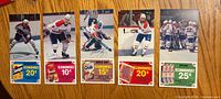 Fronts showing all five cards with coupons