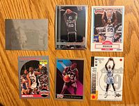 Front view of all six David Robinson cards