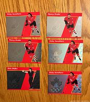 Fronts of six General Mills Jell-O Olympians cards showing foil designs and athlete images