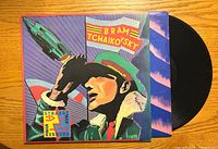 Front cover and vinyl partially visible