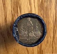 End view showing Terry Fox design on coin