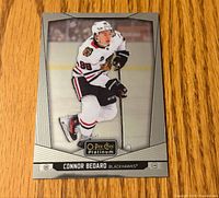 Front of Connor Bedard O-Pee-Chee Platinum hockey card showing player image and card branding