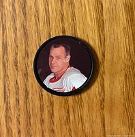 Front view showing Gordie Howe portrait in token