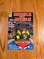 Front cover displaying title, Dell logo, price, and artwork of Heckle and Jeckle in Tunnel of Love