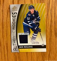 Front of card showing player image, jersey swatch, serial number 344/399