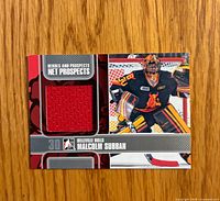 Front of Malcolm Subban Net Prospects jersey card with red swatch and player image