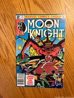 Front cover of Moon Knight #11 comic showing title, price and artwork