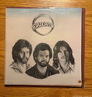Front cover of sealed Orleans LP showing logo and band portraits
