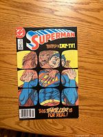 Front cover showing Superman #421 with tagline and issue details