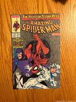 Front cover showing title, issue number 321, characters Spider-Man, Paladin, Silver Sable