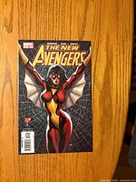 Front cover showing title, series, issue details and Spider-Woman artwork