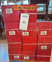 Stack of eleven red Baccarat boxes