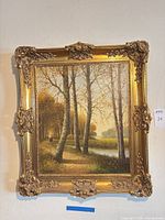 Full view of framed painting on wall