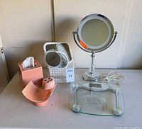 Group shot of all bathroom vanity items on table