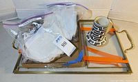 Glass tray, bagged scallop dishes, graphic mug grouped together
