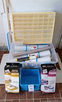 Overall lot with drawer cabinet, tote, shelf liner rolls, Space Bag boxes, blue bin
