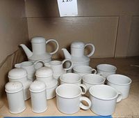 Full set of Midwinter white ceramics on shelf