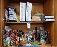Cabinet with full assortment showing both shelves and majority of items