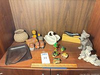 Shelf view showing all listed décor items