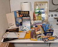 Overall view of assorted art supplies on shelf