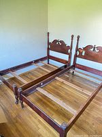 Both twin bed frames assembled showing overall design