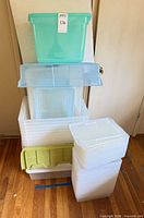 Stacked view of all plastic storage bins