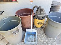 Overall group shot showing vacuum, three bins, dust pan