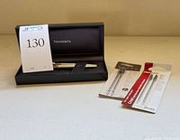 Set in open Tiffany & Co. case with two Pentel refill packs