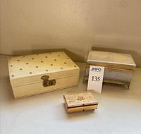 Three boxes displayed together for overview