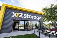 Exterior view of XYZ Storage building with logo