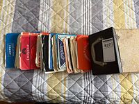 Stack of sleeved singles with carry case