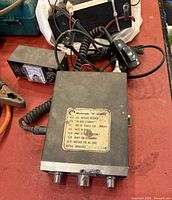 Top view of Realistic CB radio with microphone and wiring visible