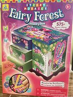 Front of sealed Sticky Mosaics Fairy Forest Jewelry Box kit showing product image and 575+ pieces note