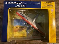 Front view of boxed Ford Tri-Motor model showing Modern Jets Lockheed Martin branding