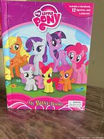 Front cover of My Little Pony My Busy Books showing title and contents note