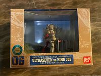 Front of boxed Bandai Ultraseven vs King Joe figure, product number 06