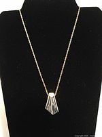 Full view of necklace on display bust