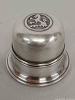 Closed silverplated Birks ring box showing crest on lid