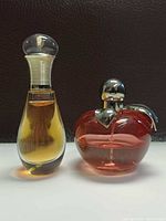 Front view of both perfume bottles