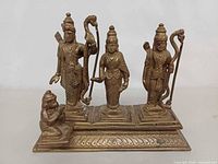 Front view of brass Hindu deity sculpture
