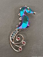 Front view of Swarovski Celaya seahorse brooch
