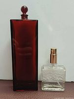 Front view of both bottles showing size and form