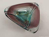 Top view showing sommerso layers of teal and amethyst in triangular bowl