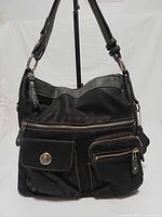 Front view showing overall design, pockets and hardware