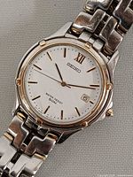 Front view of Seiko 7N32-0049 dial showing hands, indices, date window and bezel detail