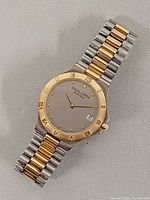 Front view of Solvil et Titus Panther wristwatch showing dial, bezel and bracelet