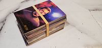 Stack of Star Trek trading cards bound by rubber band