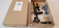 Box with Just Simply Tools label and unopened fly tying vise components